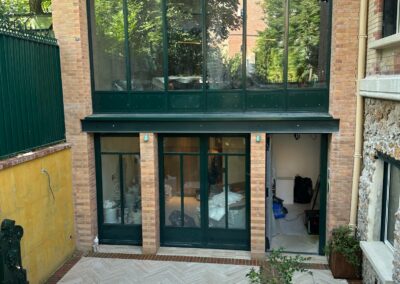 Surélévation, extension et aménagement de combles à Paris